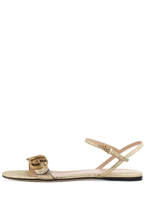 gucci metalic gold flats|Gucci double g leather sandals.